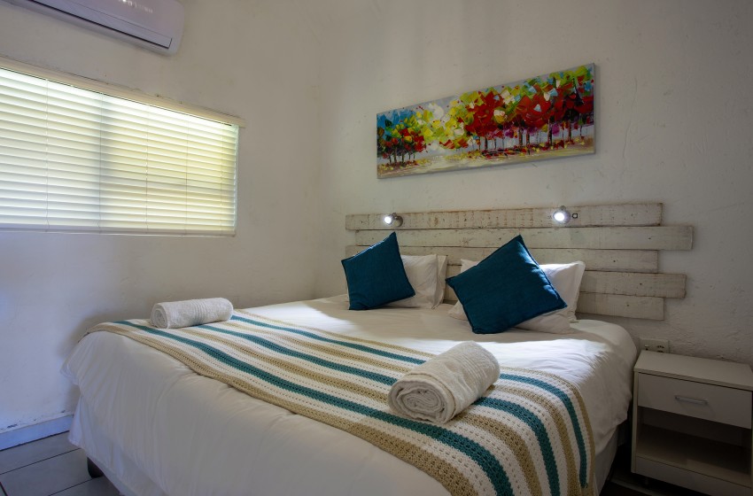 Bedroom at Baleia Azul 16 in Ponta Mamoli