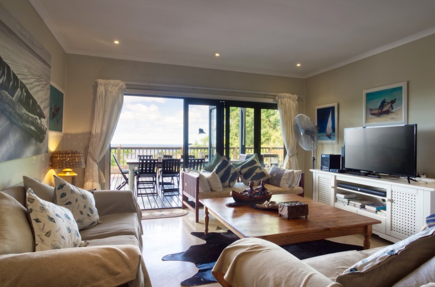 Living room with view at Campismo Ninho 40 in Ponta Malongane
