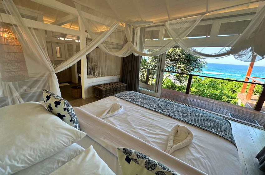 Bedroom 1 with sea view at Aloha 17 in Ponta Mamoli