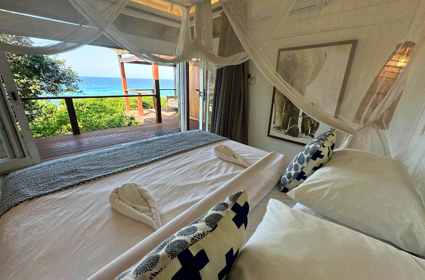 Bedroom 1 with sea view at Aloha 17 in Ponta Mamoli