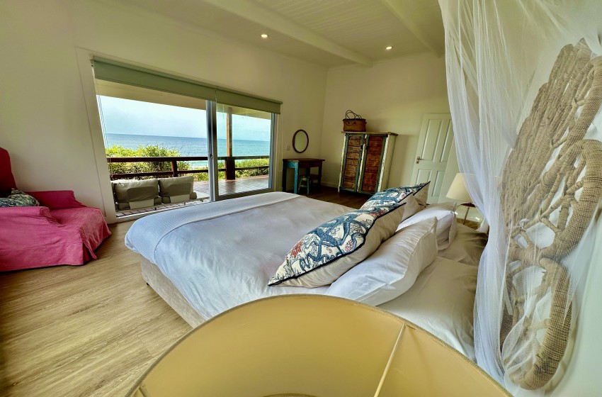 bedroom 1 with sea view at Wakene 5 in Ponta Malongane