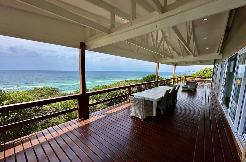 deck with seating and sea view at Wakene 5 in Ponta Malongane