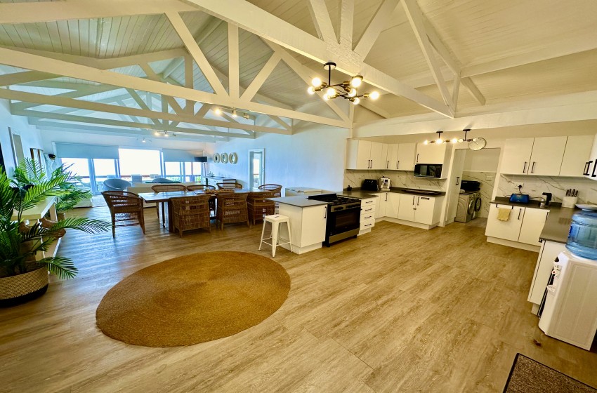 kitchen with living room view at Wakene 5 in Ponta Malongane