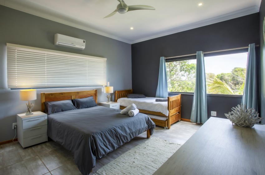 bedroom 1 with veiw at Naudicals dune in Ponta Malongane