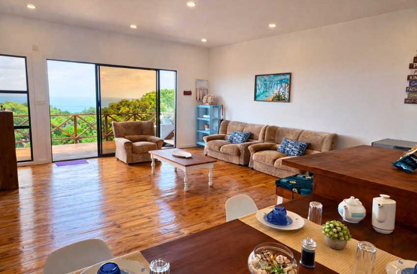 living room with sea view at Salt and Sun in Ponta Malongane
