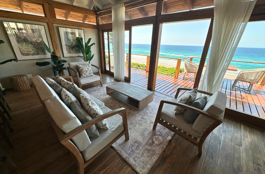 interior lounge area with sea view at Aloha 5 in Ponta Mamoli