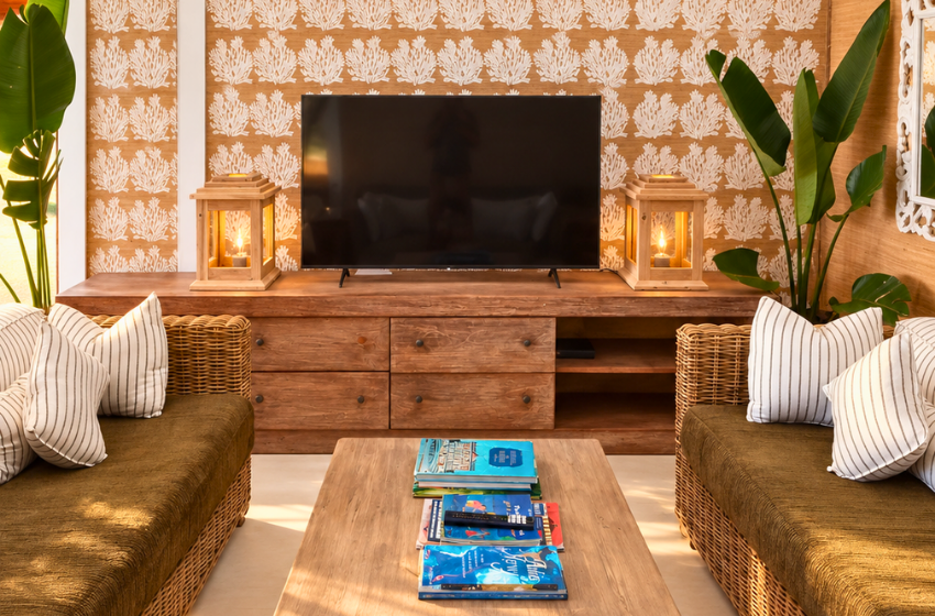 couches with TV at Aloha 7 in Ponta Mamoli
